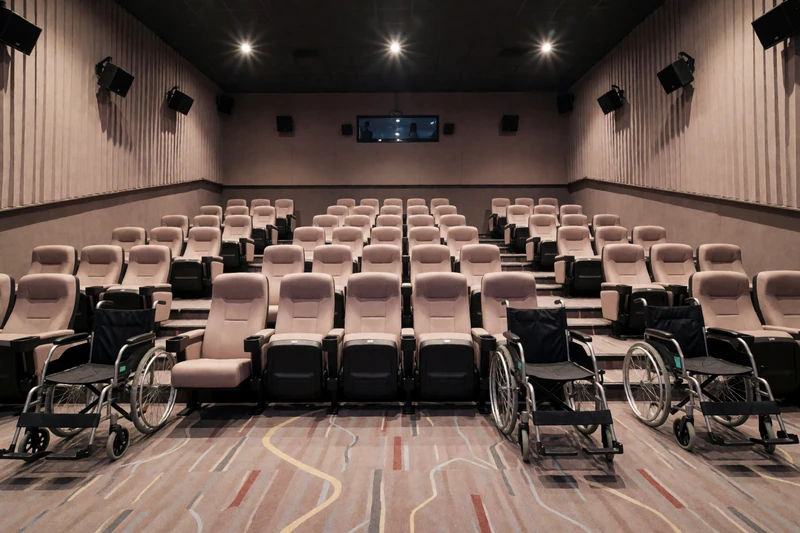 Accessible movie theater with wheelchair spaces and companion seating, an ideal date venue for cerebral palsy dating